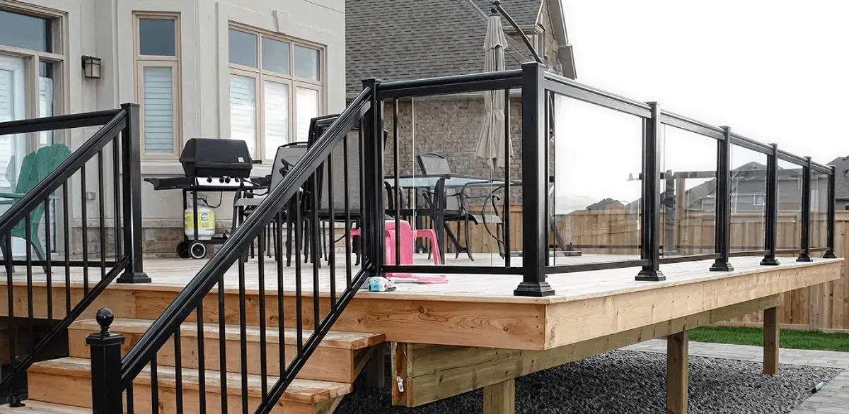 Handrail installation on a deck staircase for safety and code compliance in Fort Worth, TX