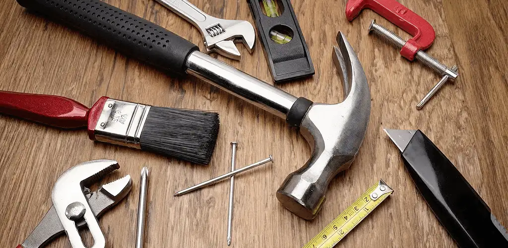 Handyman tools laid out for home repair and maintenance work in Fort Worth, TX